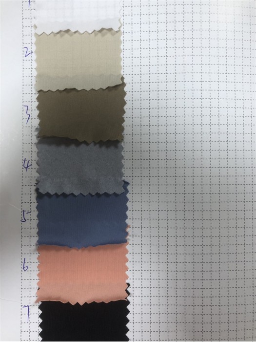 SX-DY 521010 50D milk silk polyester stretch frame Specification: 160CM Gram weight: 100G Composition: 88T 12SP ultra-thin sports cloth