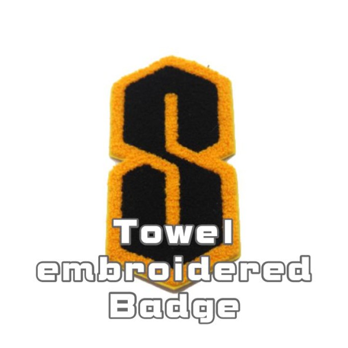 Towel embroidered Badge